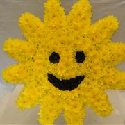 Sun funeral flower tribute